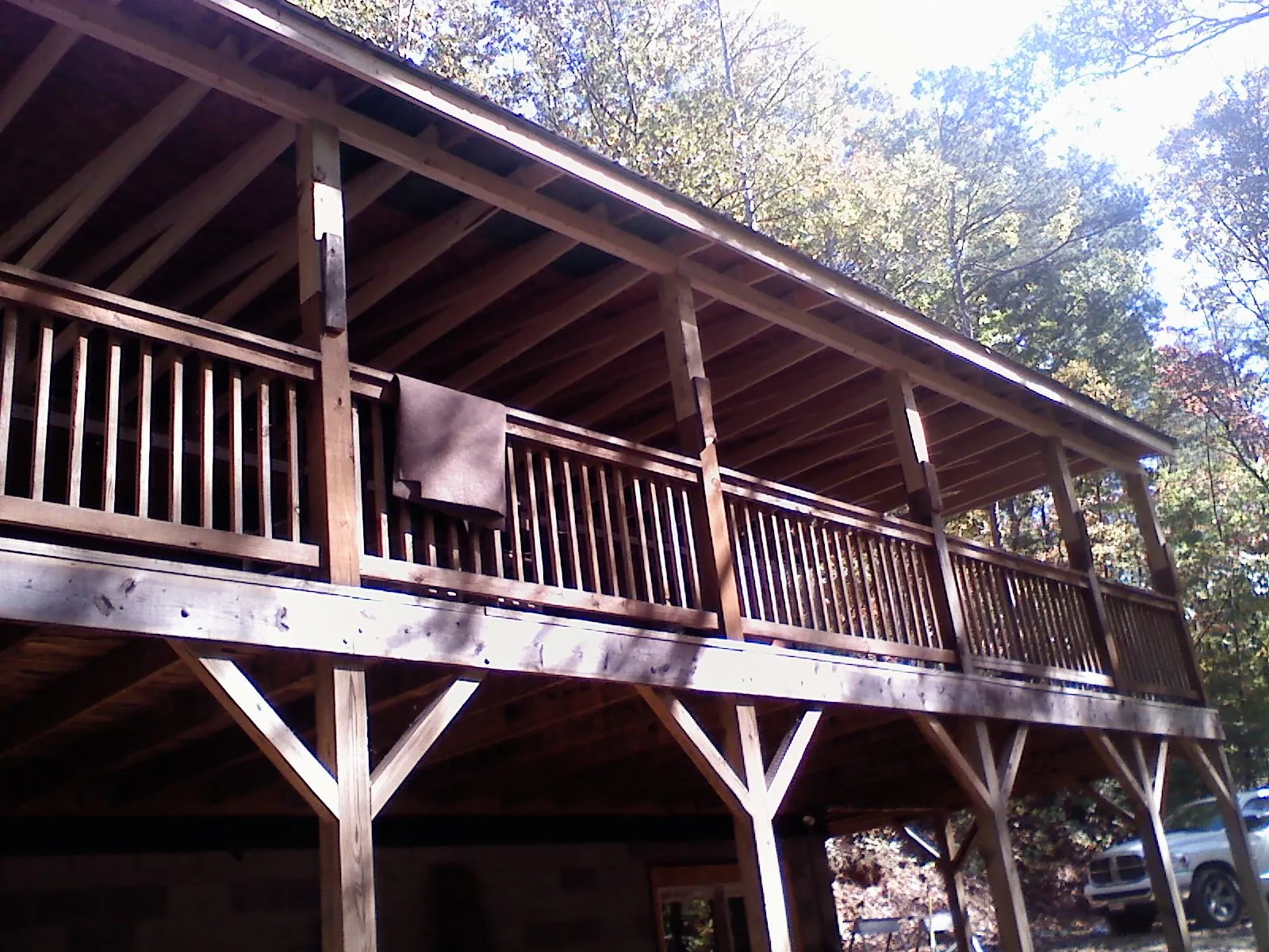 Timber framing under a new elevated porch and deck — Roof Leak Repair in Oakham by Roofing Brothers